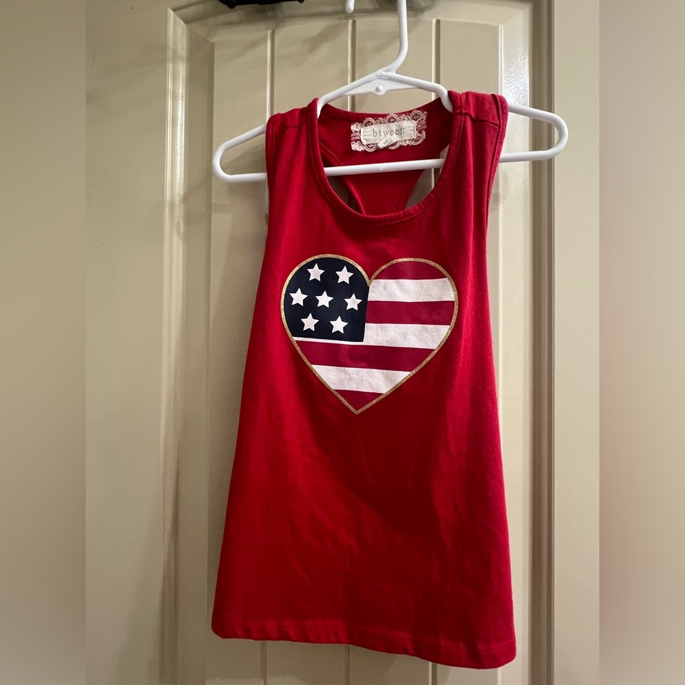 Girls Btween American Flag Heart Tank with twisted back. Size 6.